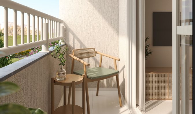 Varanda com poltrona e vaso de planta